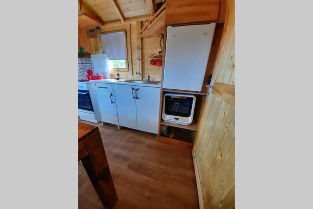 Apartamento Autarkes Tiny House Mit Rheinblick Rumikon Exterior foto